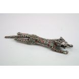 Plique-a-jour marcasite white metal brooch modelled as a leopard outstretched, length approx 12cm