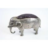 Early 20th century silver novelty pin cushion modelled as an elephant, hallmarks rubbed,