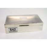 Silver cigarette box, blank rectangular cartouche to centre, engine turned decoration, makers E &