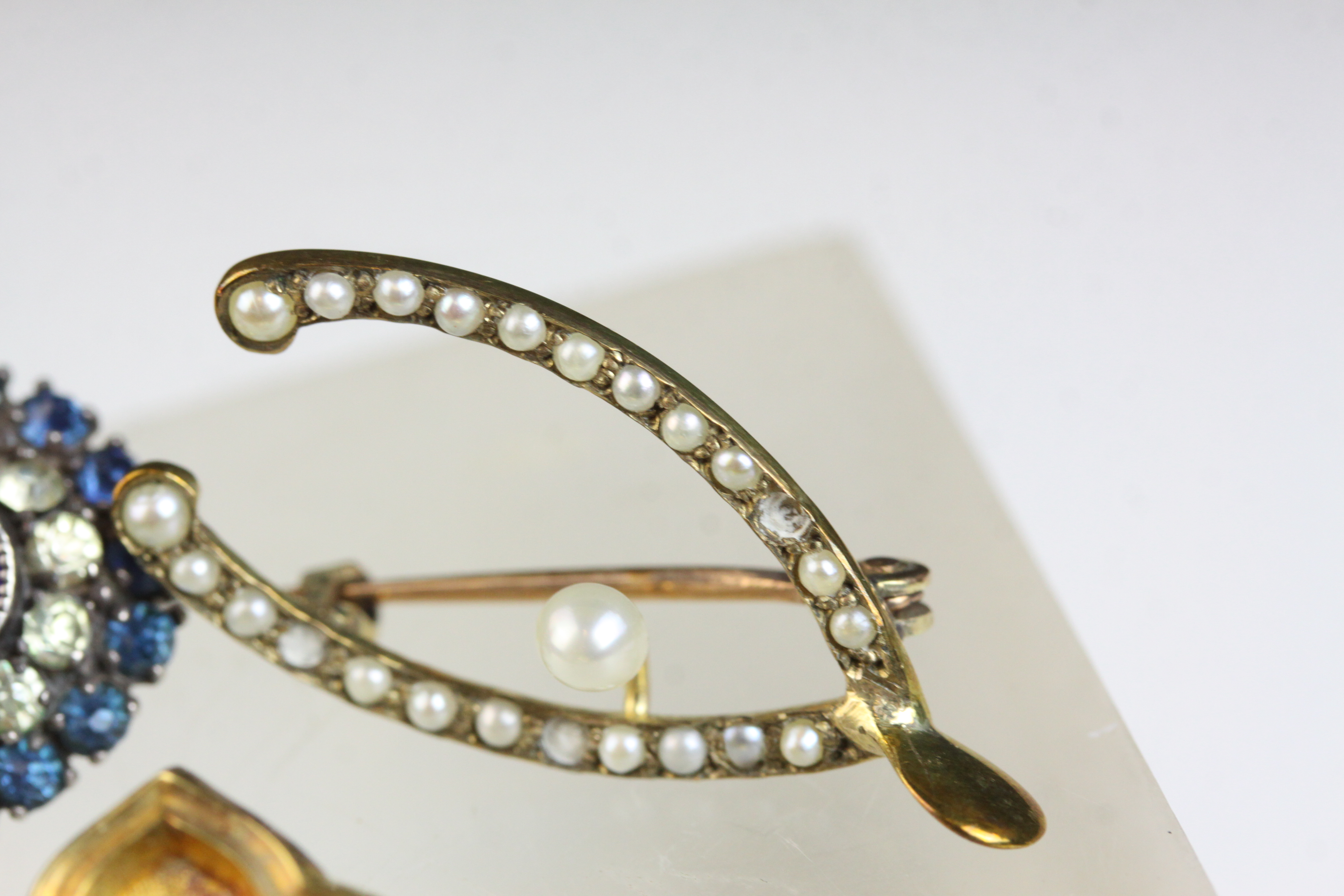 Victorian seed pearl 9ct yellow gold wishbone brooch, (three seed pearls deficient), length approx - Image 3 of 4