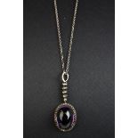Victorian amethyst and paste silver and gold backed pendant necklace, the oval cabochon cut amethsyt