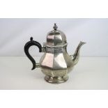 Early 20th century silver bachelor's teapot, bulbous octagonal form, raised on circular moulded