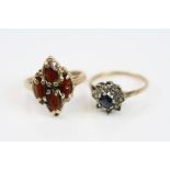 Garnet 9ct yellow gold dress ring, ring size L together with a sapphire and diamond flower head