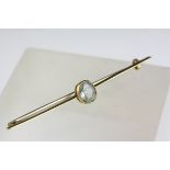 Late Victorian aquamarine yellow metal bar brooch, the oval mixed cut aquamarine measuring approx