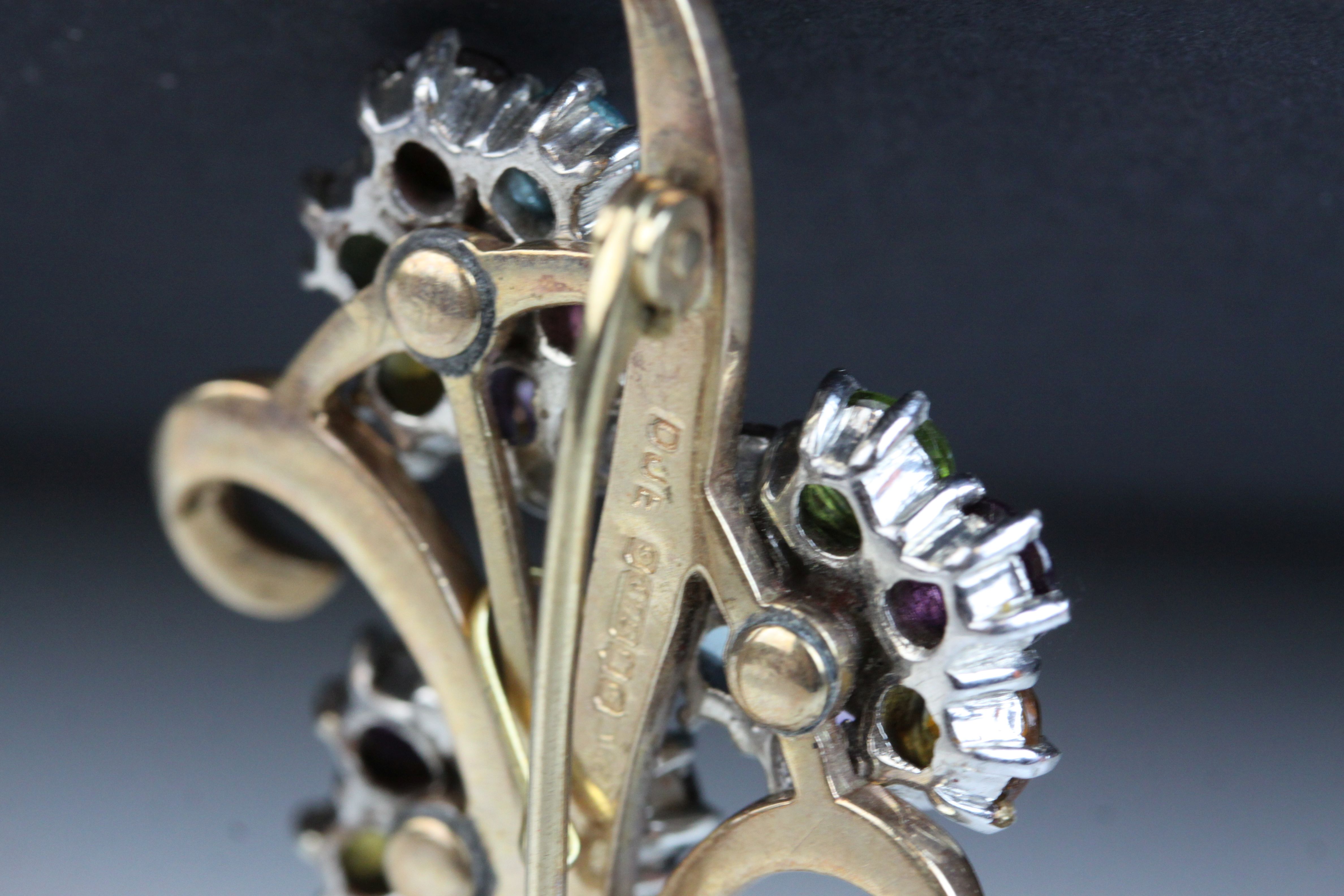 Multi-gemstone 9ct yellow and white gold floral spray brooch, the flower heads set with amethyst, - Image 7 of 7