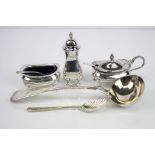 Matched three piece silver cruet, comprising open salt cellar, pepper pot, mustard pot, blue glass