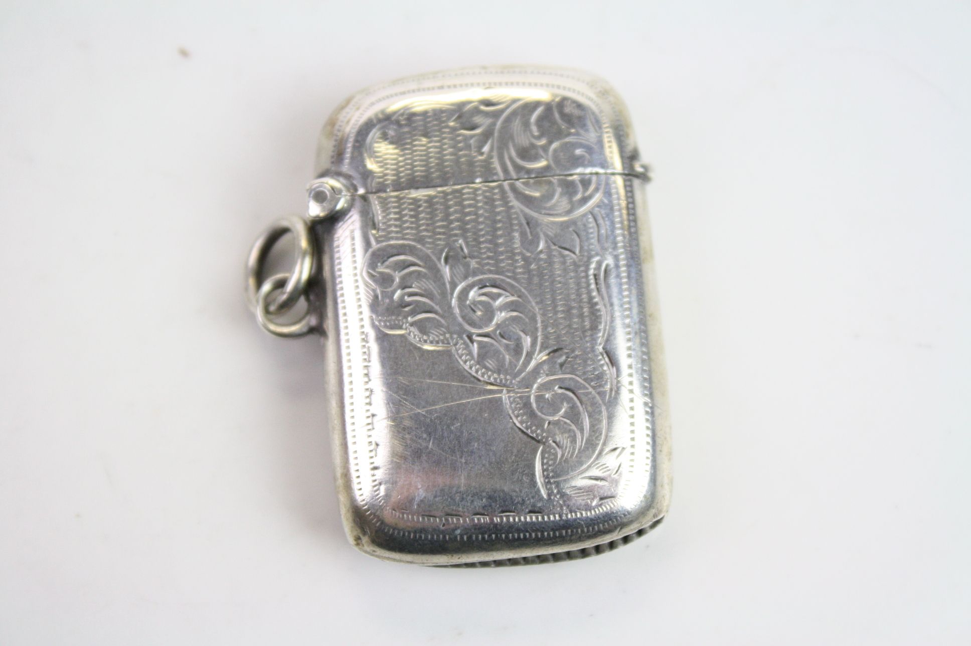 Edwardian silver vesta case, engraved foliate decoration, hallmarked Birmingham 1904, length