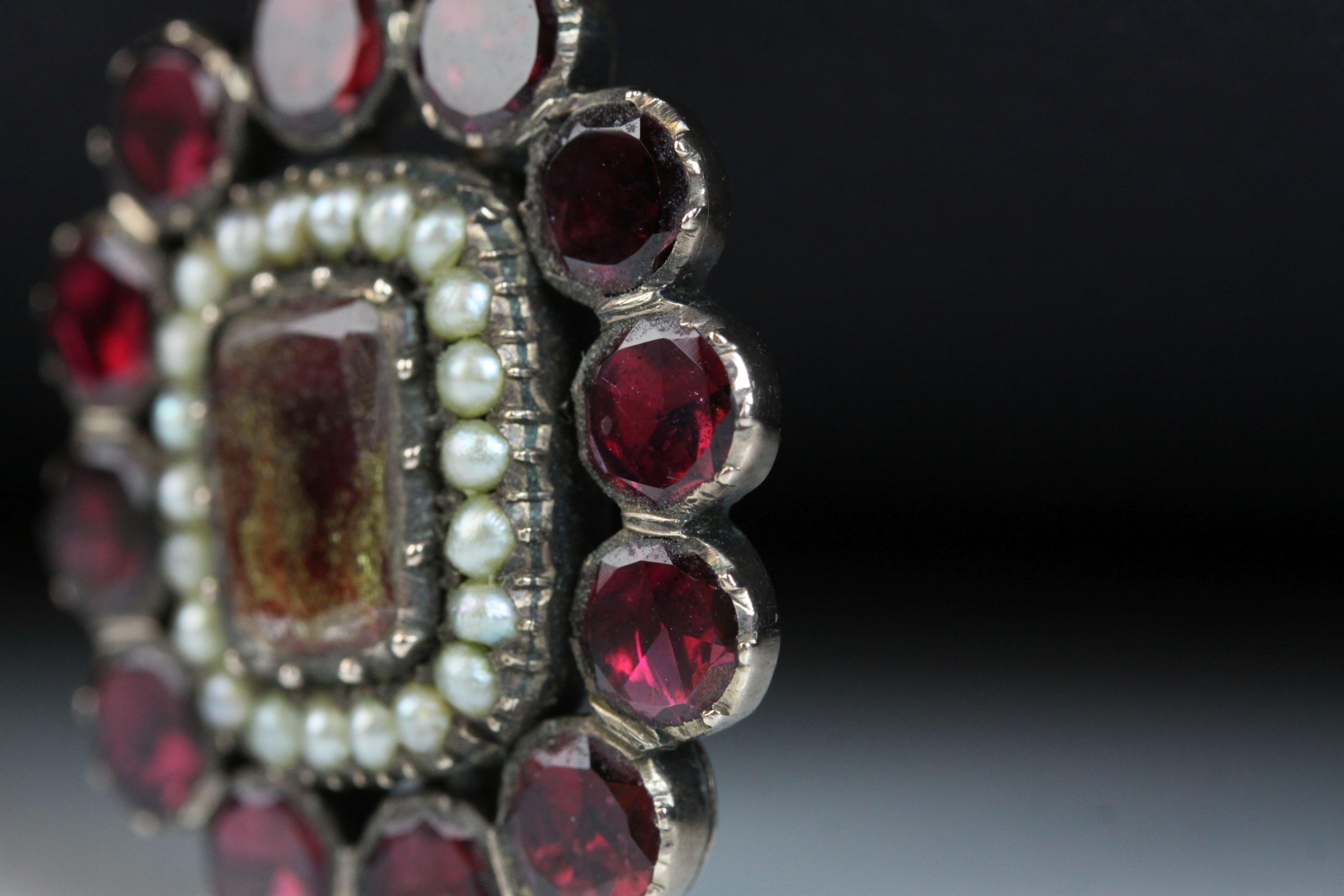 Georgian flat cut garnet and seed pearl brooch, unmarked rose gold, the central flat cut rectangular - Image 4 of 7