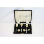Six Victorian silver gilt Apostle terminal coffee spoons, mask decoration to stem, makers Harrison