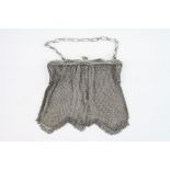 Silver chainmail evening purse, filigree decoration to clasp, silver import marks for Chester