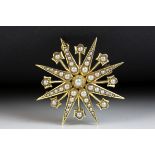 Edwardian seed pearl 15ct yellow gold pendant brooch, eight pronged star full set with graduated