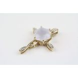 Chalcedony and diamond 9ct yellow gold pendant, fancy star cut lavender chalcedony with small