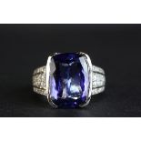 Tanzanite and diamond 18ct white gold ring, the cushion cut tanzanite with certificate stating