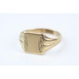 9ct yellow gold signet ring, plain polished cartouche with engraved stylised shoulders, ring size X½