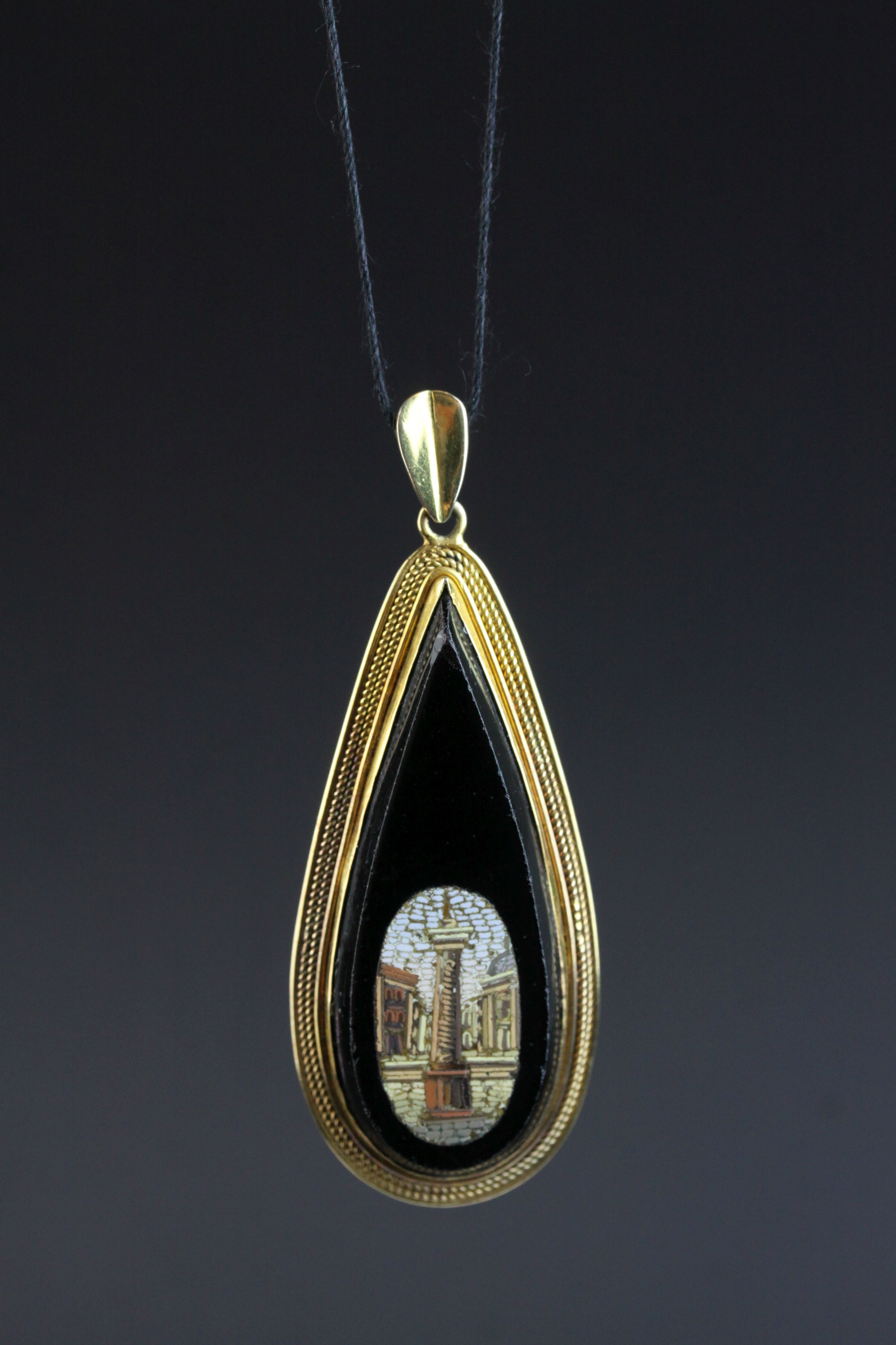 Victorian micro-mosaic unmarked yellow gold pendant depicting Trajan's Column, rub over setting,