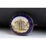 Victorian Grand Tour micro-mosaic oval brooch, the scene depicting a Roman building, yellow metal