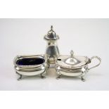 George V matched three piece silver cruet, comprising open salt cellar, pepper pot and mustard