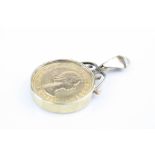 Full sovereign coin pendant, the sovereign coin dated 1968, yellow metal coin mount with glazed