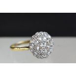 Diamond unmarked yellow gold cluster ring, small round brilliant cut and eight cut diamonds, pavé