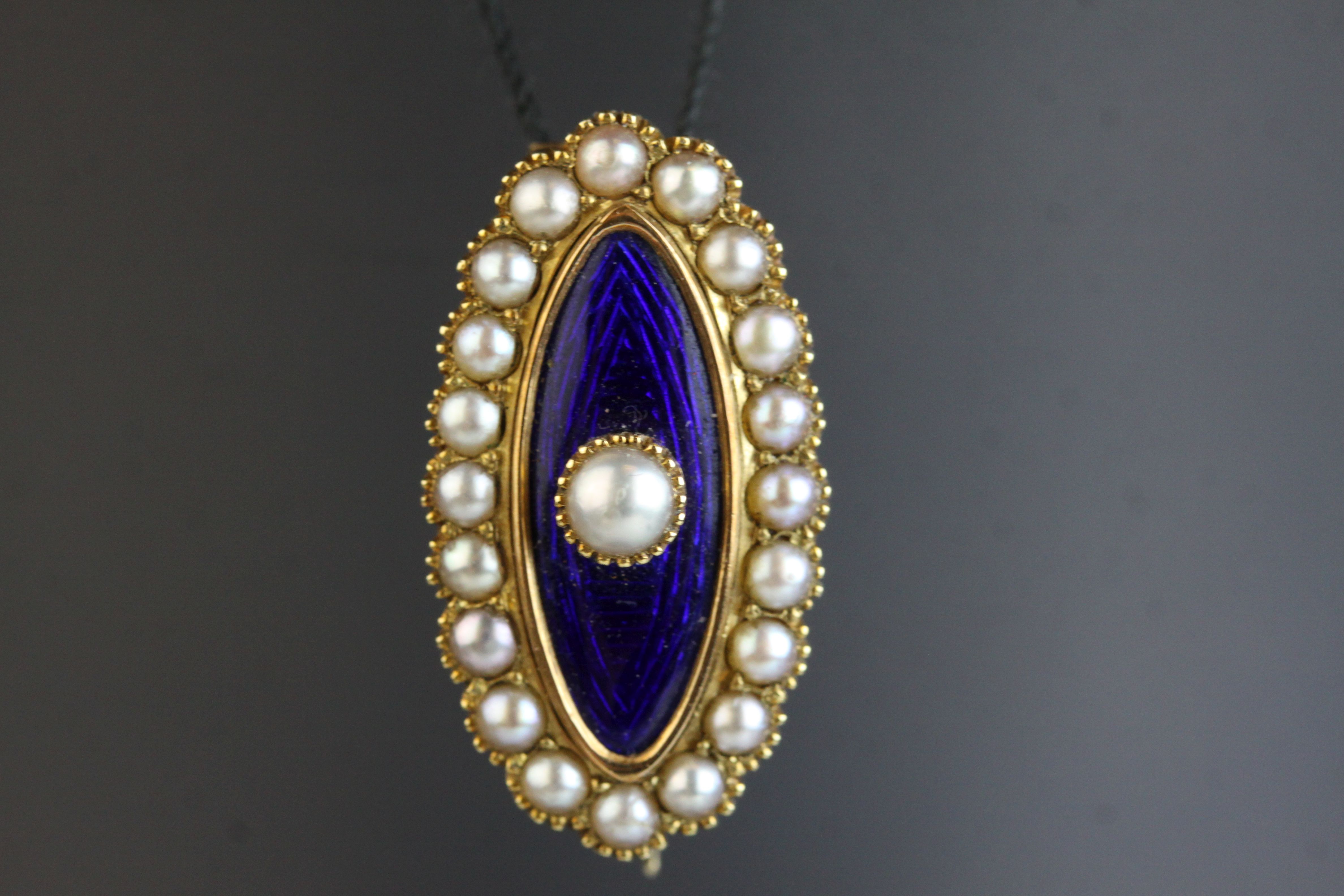 Edwardian pearl and enamelled unmarked yellow gold lace pin, the central blue enamelled marquise