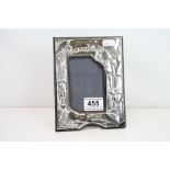 Silver rectangular photograph frame, easel back, hunting scene in relief depicting hounds, fox and