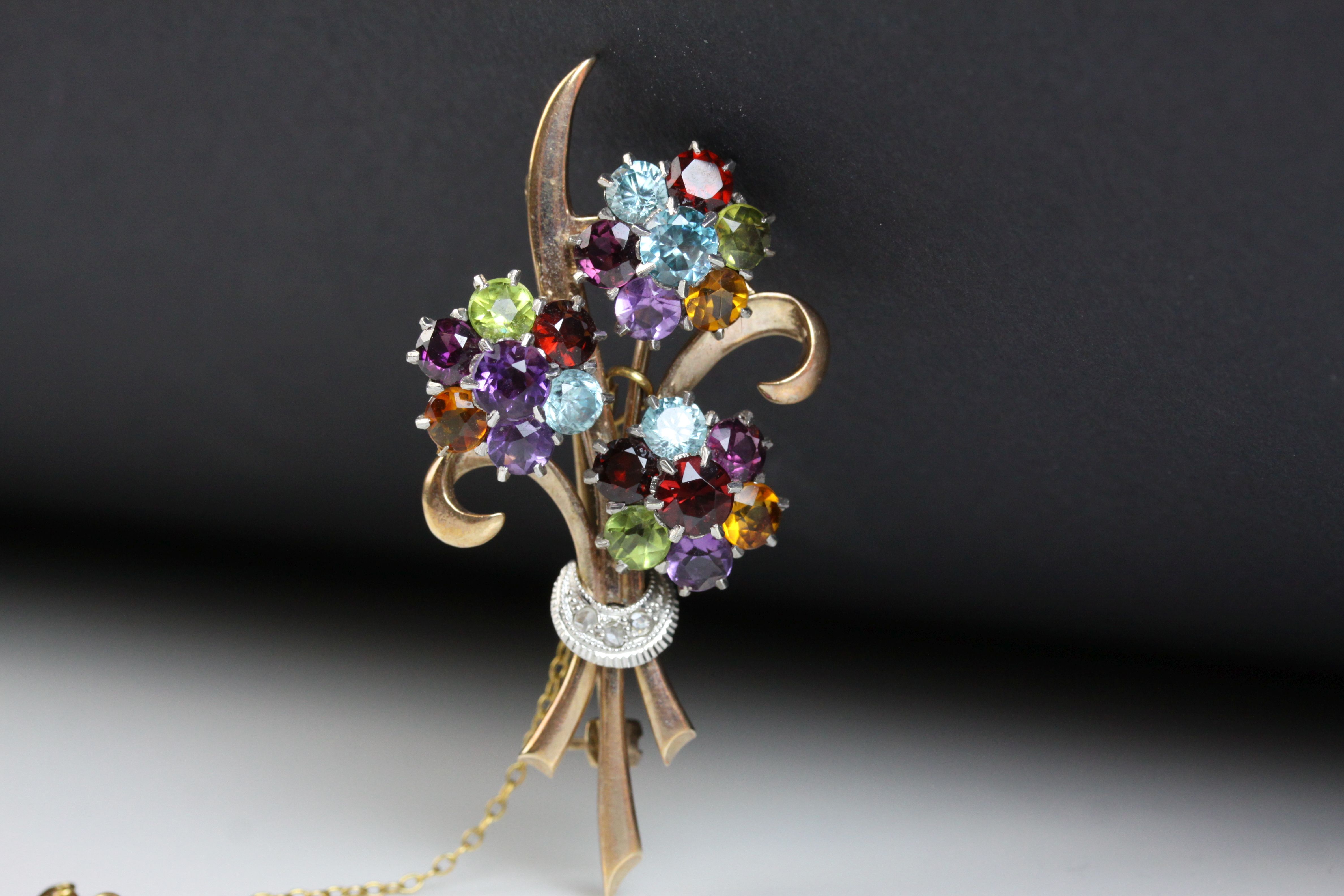 Multi-gemstone 9ct yellow and white gold floral spray brooch, the flower heads set with amethyst, - Image 4 of 7