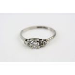 Diamond 18ct white gold and platinum ring, the principle round brilliant cut diamond weighing approx