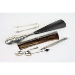 Small collection of silver items to include silver-handled shoe horn, silver back comb, two silver