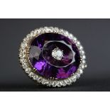 Victorian amethyst and diamond pendant brooch, the large oval faceted amethyst measuring approx 20.