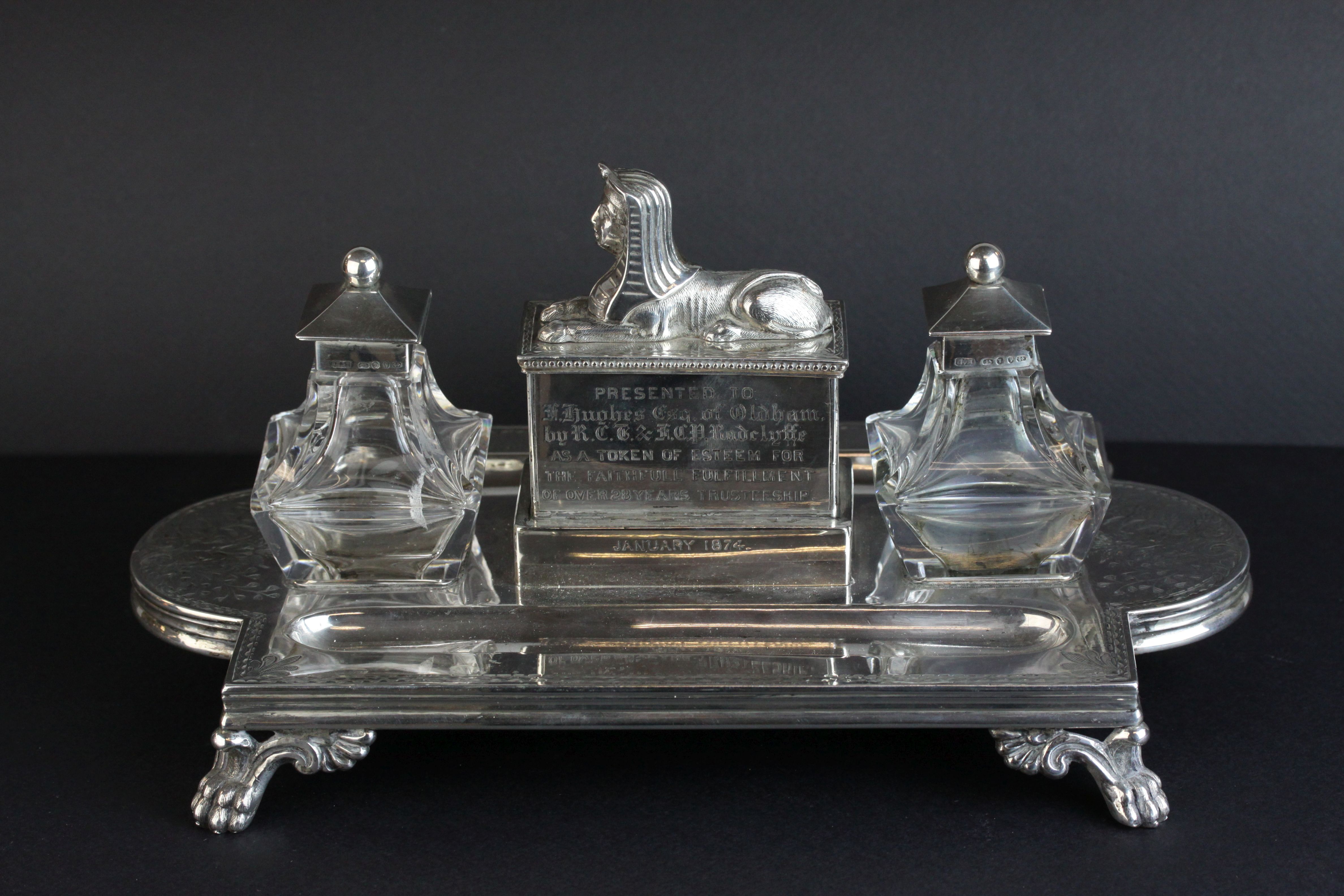Victorian silver double ink and pen desk stand, the central compartment with cast Sphinx surmount