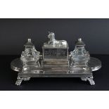 Victorian silver double ink and pen desk stand, the central compartment with cast Sphinx surmount