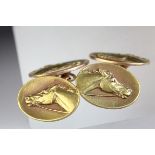 Pair of 14k rose gold chain link cufflinks, the oval panels each depicting a horse's head in relief,