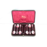 Set of six Edwardian silver coffee spoons and a pair of silver sugar tongs, hallmarked Birmingham