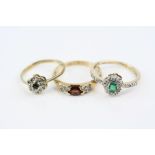 Emerald and diamond 9ct yellow gold cluster ring, small oval mixed cut emerald, four claw setting,