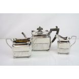 Victorian three piece silver Bachelors' tea service comprising teapot, milk jug and twin handled