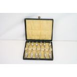 Twelve white metal sweetcorn picks, the handles modelled as corn on the cob, stamped sterling,