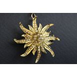 Seed pearl 14ct gold tiered sunburst pendant brooch, full set with seed pearls, later safety