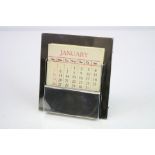 Silver desk calendar, easel back, stamped to base Udall & Ballou Sterling 2027, height approx 8.