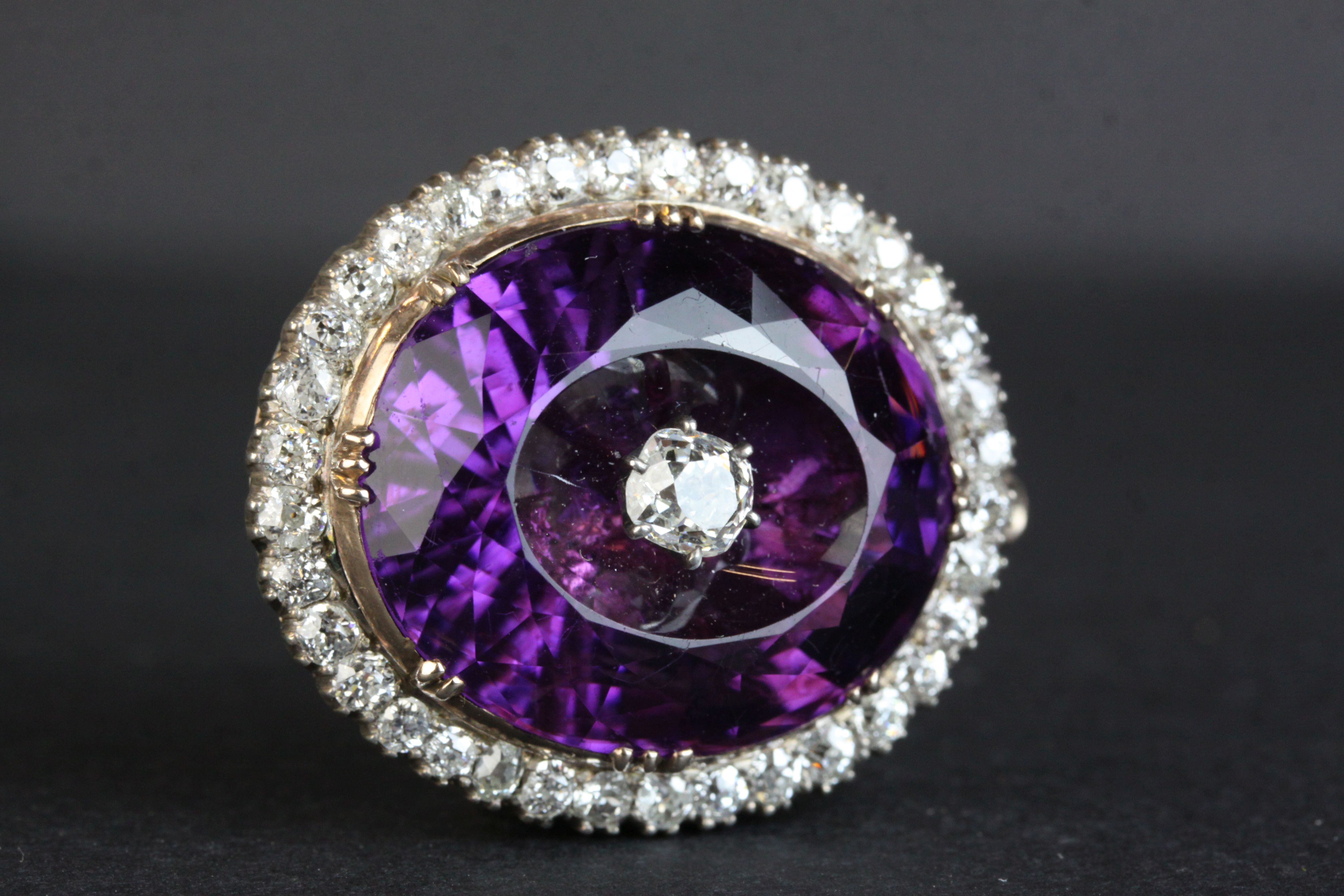 Victorian amethyst and diamond pendant brooch, the large oval faceted amethyst measuring approx 20. - Image 3 of 6