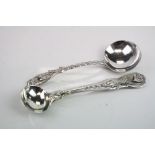 George III silver salt spoon, Kings pattern, hallmarked, together with a German silver caddy spoon,
