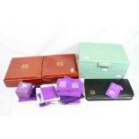 Three empty jewellery boxes together with jewellery pouches and a large quantity of Gemporia