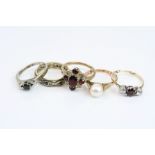 Five dress rings comprising pearl 9ct yellow gold ring, resized with spacers, approx M½, a blue and