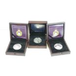 Three cased Silver proof £5 coins to include The House of Windsor Centenary x 2 and Her Majesty