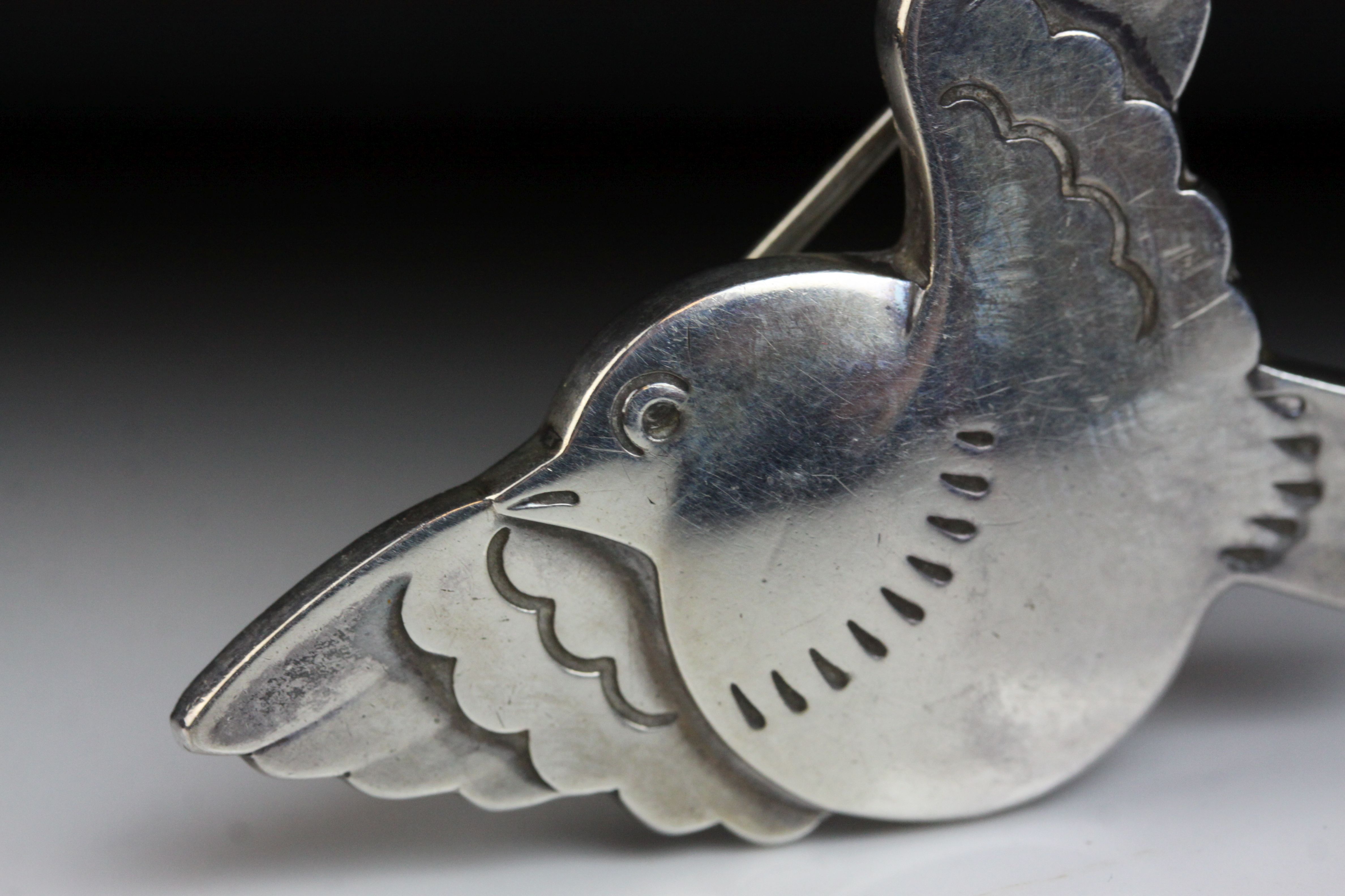Arno Malinowski for Georg Jensen; a sterling silver brooch modelled as a bird with wings - Image 2 of 3