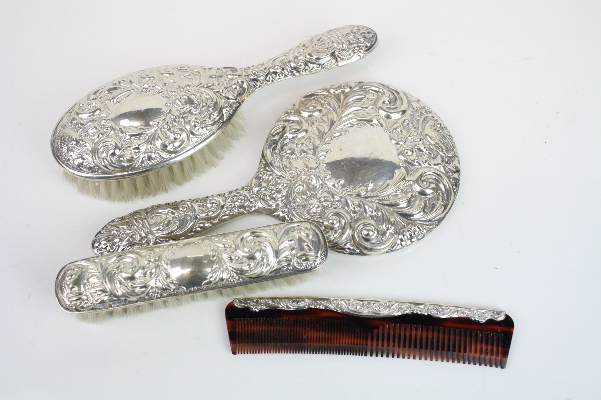 Four piece silver backed dressing table brush set comprising hair brush, hand mirror, comb and - Image 6 of 6