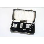 Cased mid 20th century matched silver three piece cruet set, comprising salt, pepper and mustard,