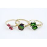 Ammolite triplet 9ct yellow gold ring, chrome diopside yellow gold ring together with a pink