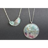 Scottish enamelled silver pendant necklace, the circular disc with stylised floral design, makers