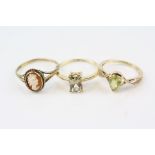 Green stone 9ct yellow gold ring, rectangular mixed cut stone, four claw setting, ring size L½; a