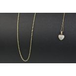 Cubic zirconia 9ct yellow gold and white gold heart shaped pendant necklace on fine 9ct gold